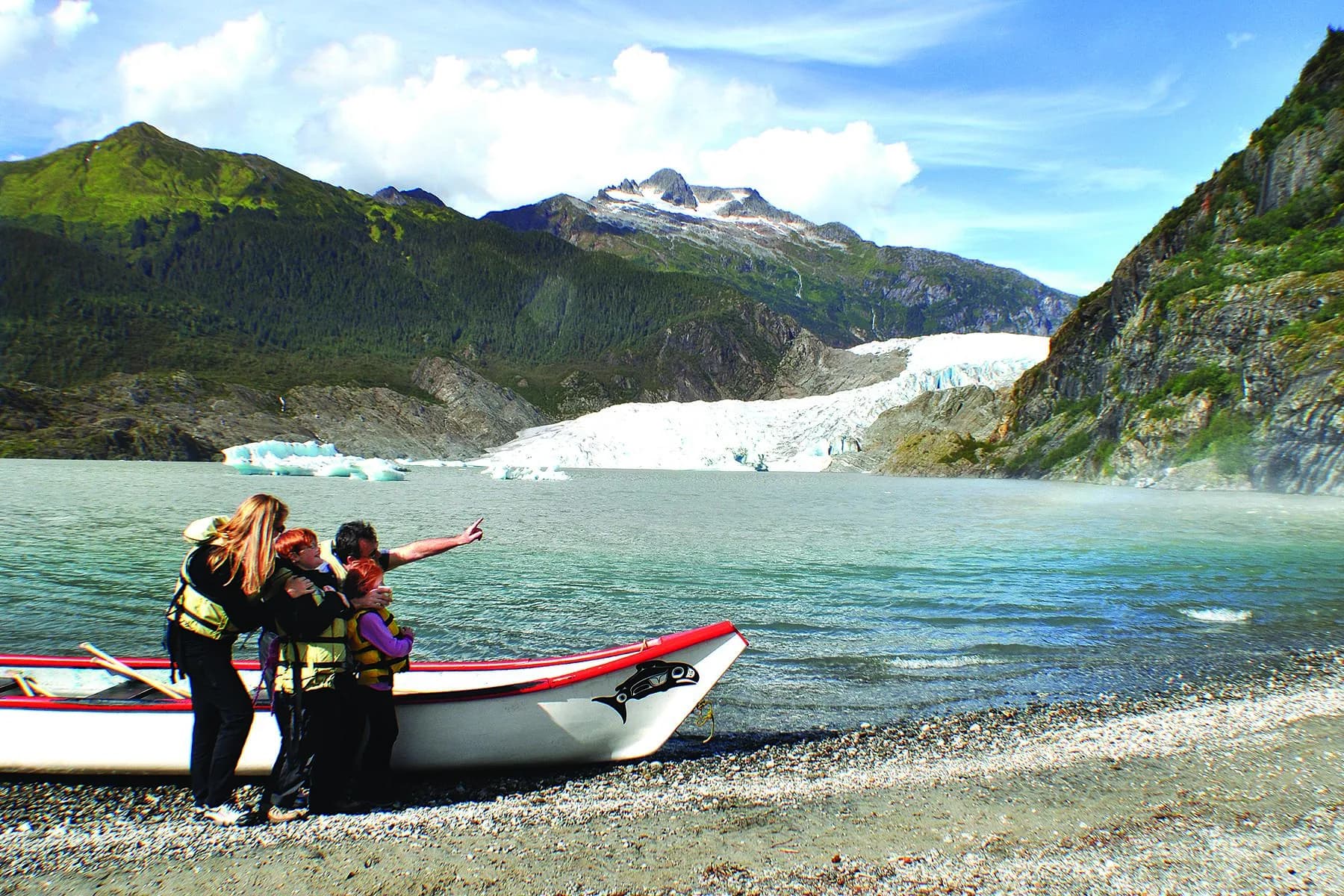 Family exploring the waters near Juneau, Alaska